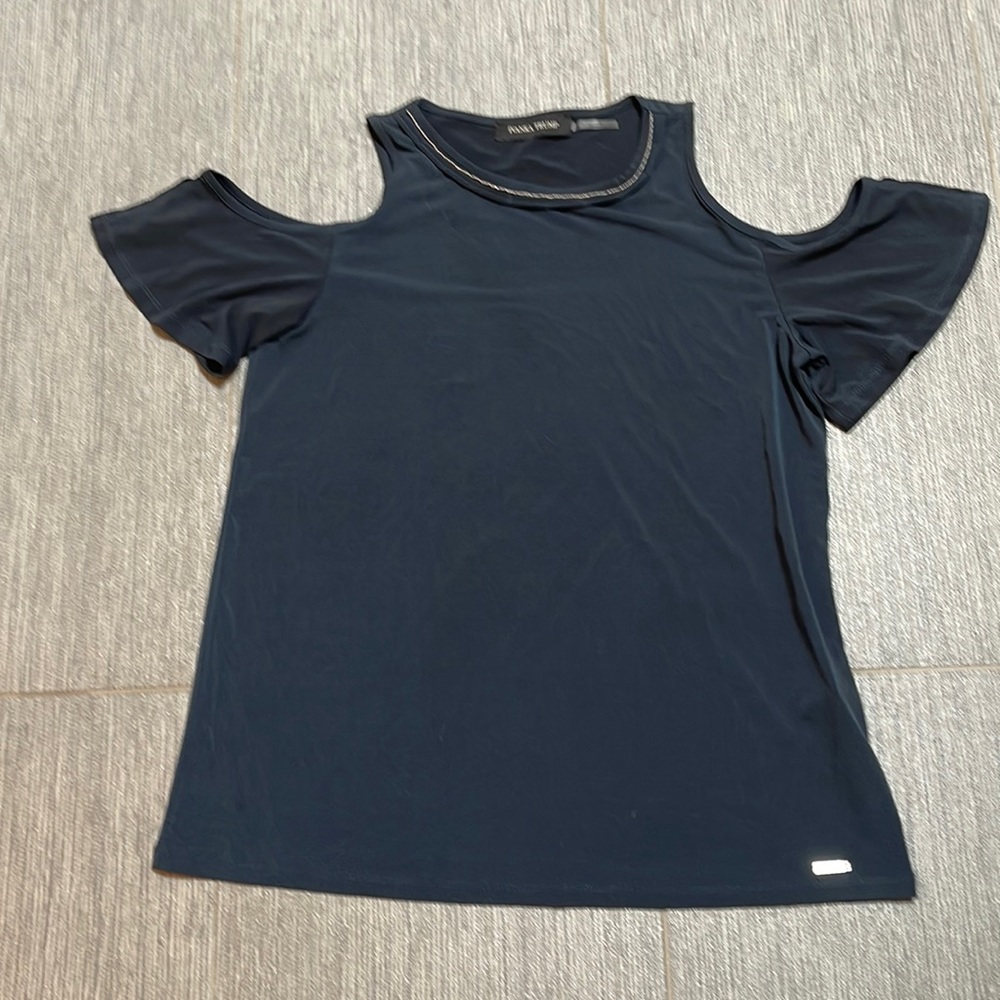 Ivanka S/P too open shoulders with a split style opening in the sleeve area